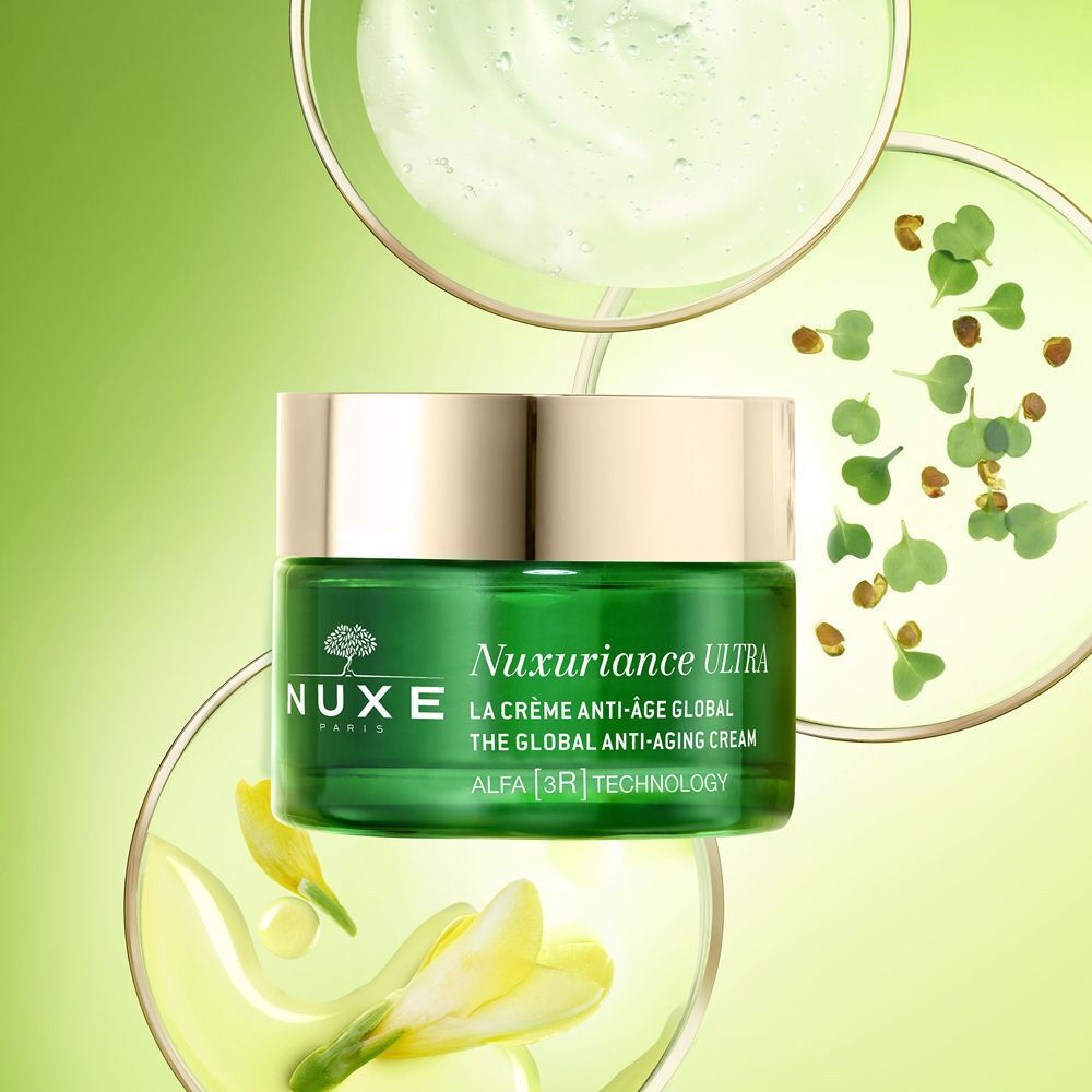 Barattolo di crema Nuxe Nuxuriance Ultra in capsule Petri con piante e liquidi.