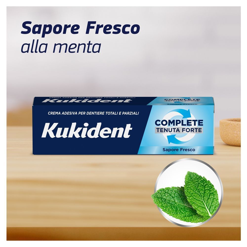 Kukident Complete, crema adesiva per dentiere, sapore fresco alla menta.