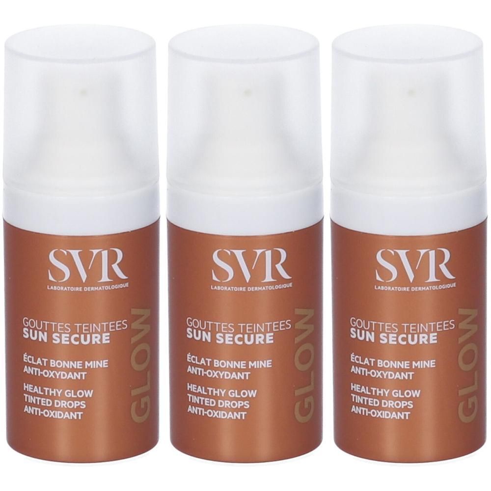 Tre flaconi SVR Sun Secure Glow gocce colorate con tappi a pompa bianchi ed etichette color bronzo.