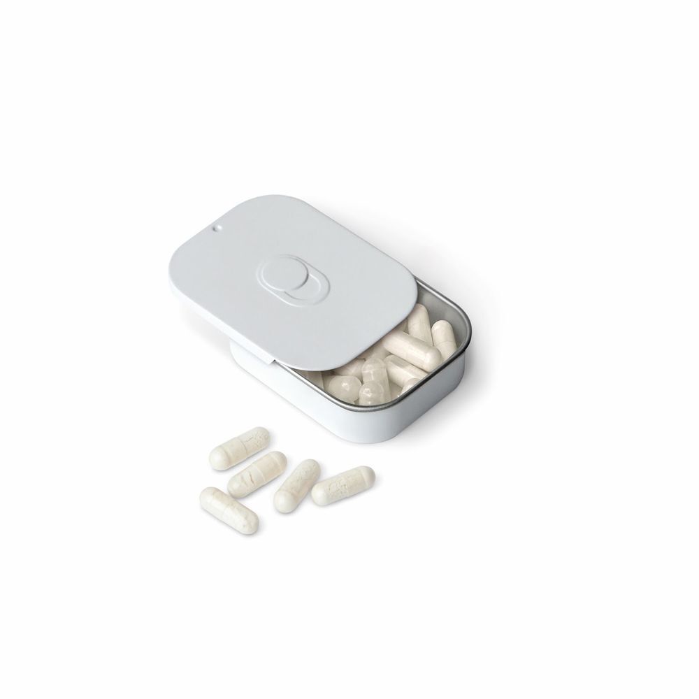 Un astuccio bianco in metallo con coperchio aperto, contenente capsule bianche. Alcune capsule sono sparse accanto.