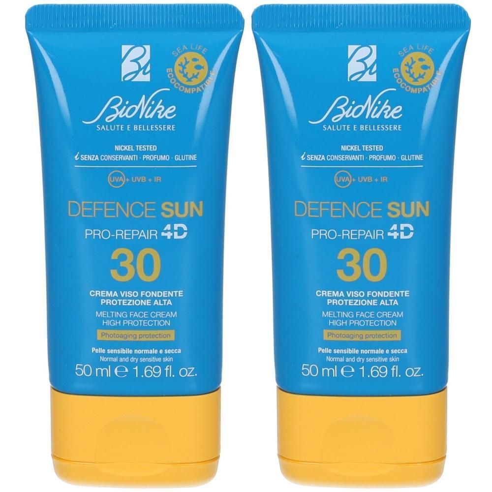 Due tubetti di crema viso Bionike Defence Sun SPF30 con tappo giallo.