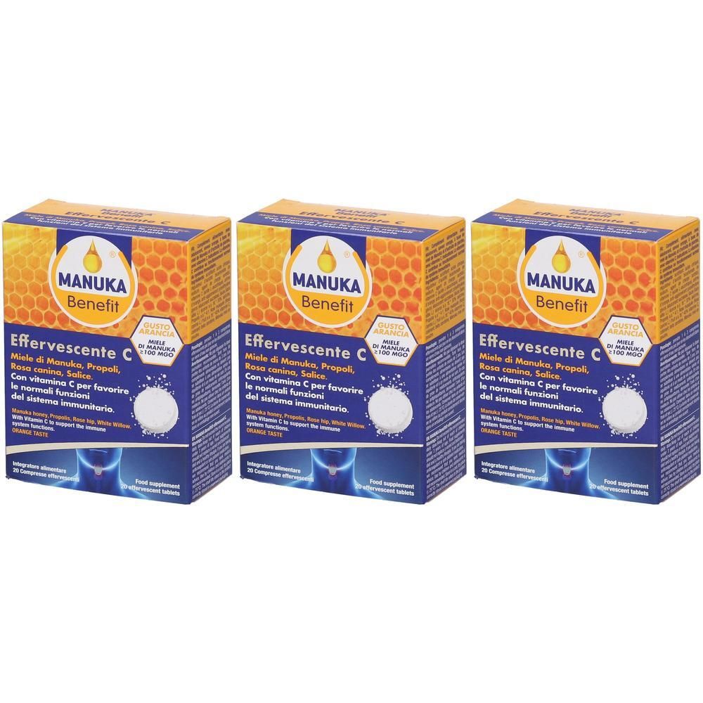 Tre scatole di MANUKA Benefit Effervescente C con miele e vitamina C. Sono raffigurati compresse effervescenti bianche.