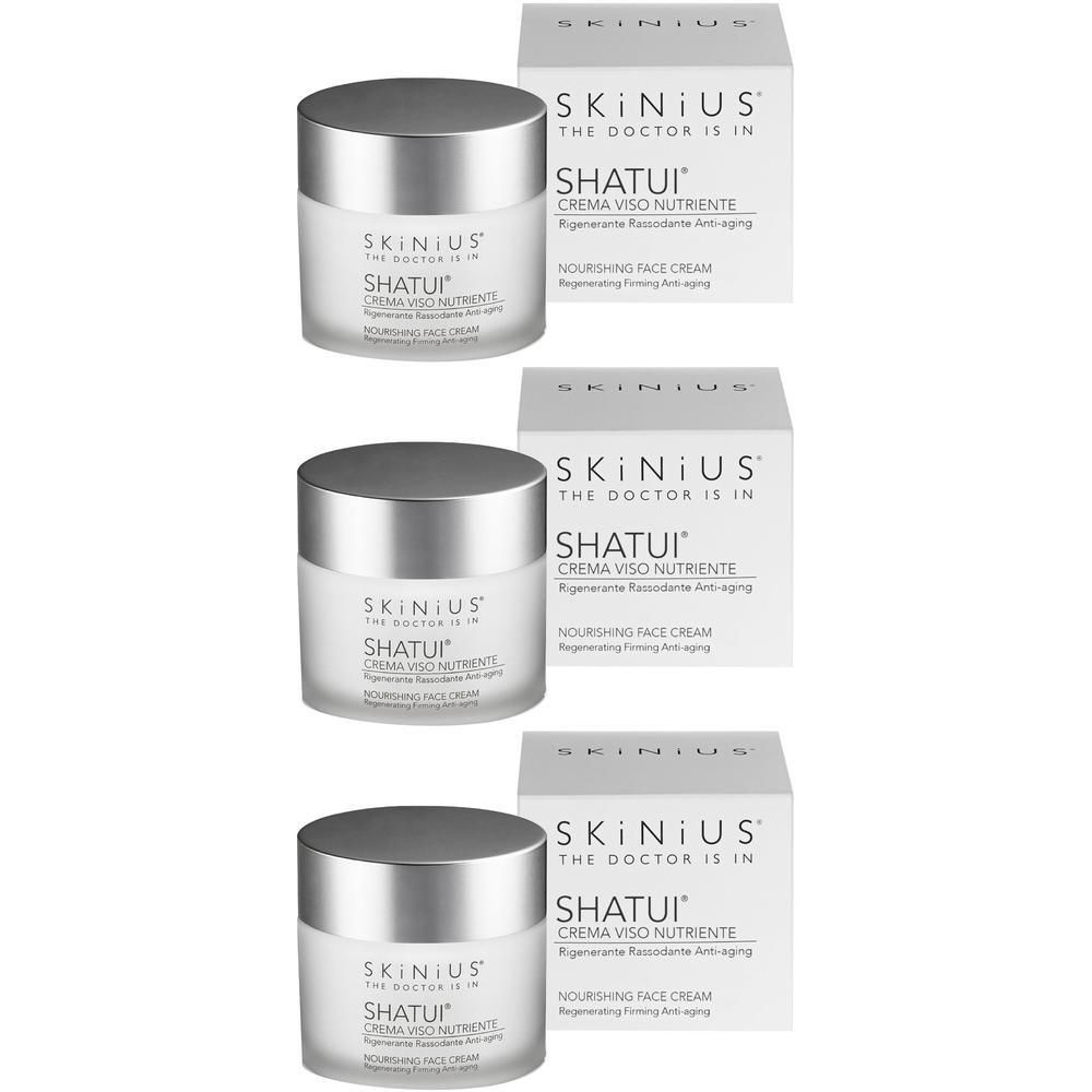 Tre barattoli di crema viso Shatui con tappi argentati e scatole.