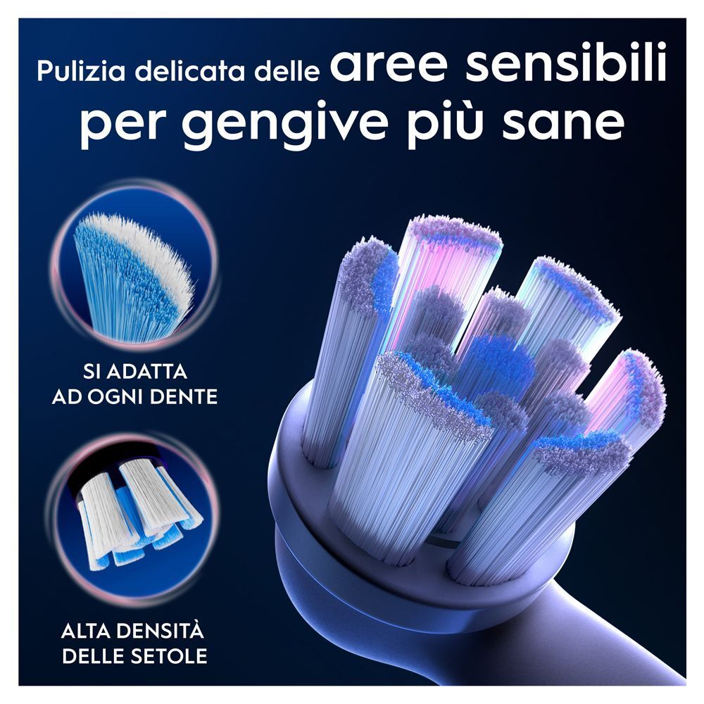 Primo piano di una testina di spazzolino elettrico con molte setole blu e viola.
