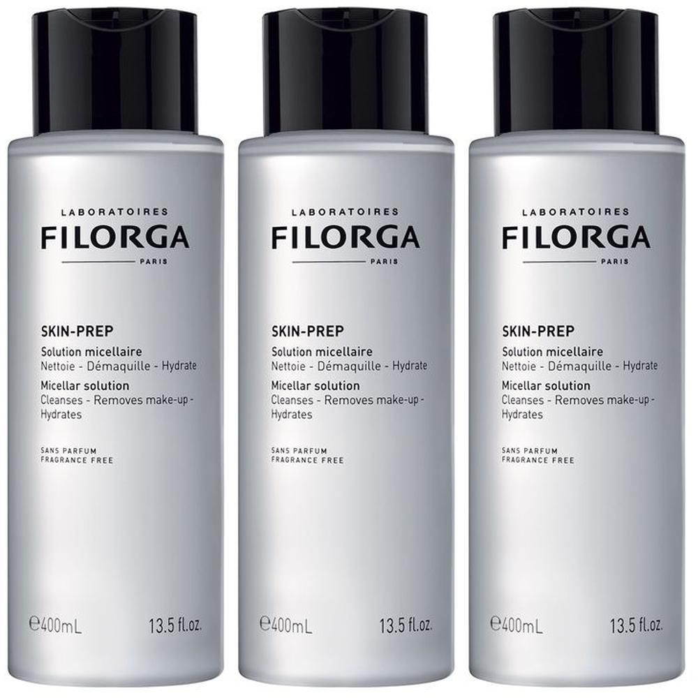 Tre flaconi argentati Filorga Skin-Prep con tappo nero. Soluzione micellare, 400ml.