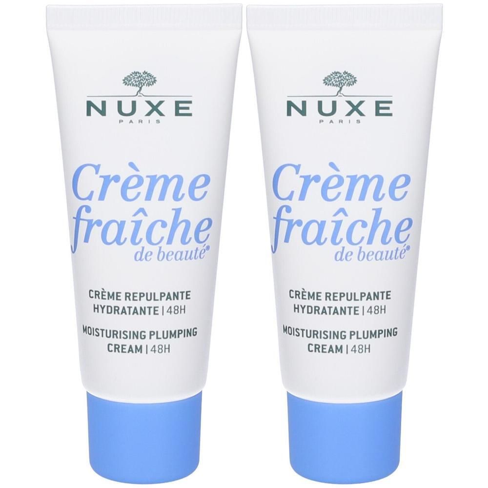 Due tubetti di NUXE Crème fraîche de beauté idratante con tappo blu.