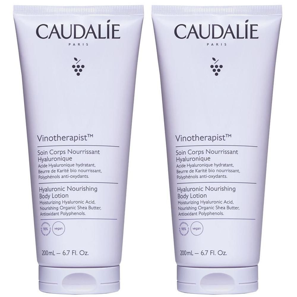 Due tubi bianchi di Lozione Corpo Ialuronico Nutriente Caudalie, 200ml ciascuno.