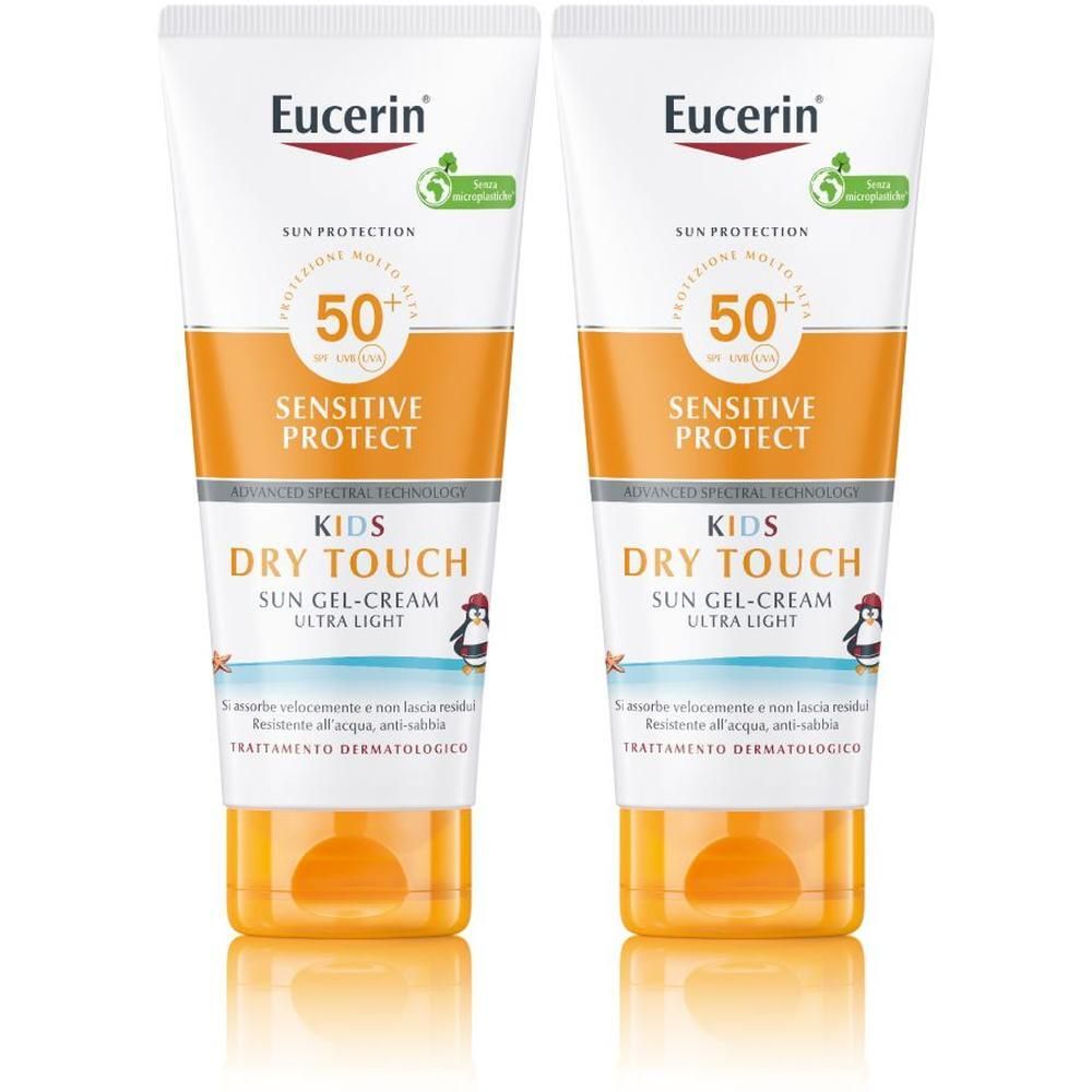 Due tubi di Eucerin Kids Sun Lotion Sensitive Protect SPF50+ con tecnologia "Dry Touch".