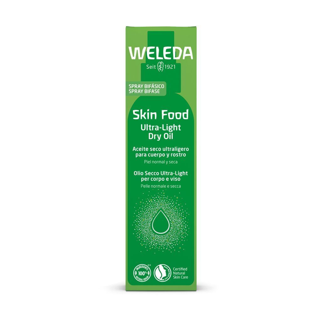 Confezione verde per WELEDA Skin Food Olio Secco Ultra-Light Spray con sigilli.