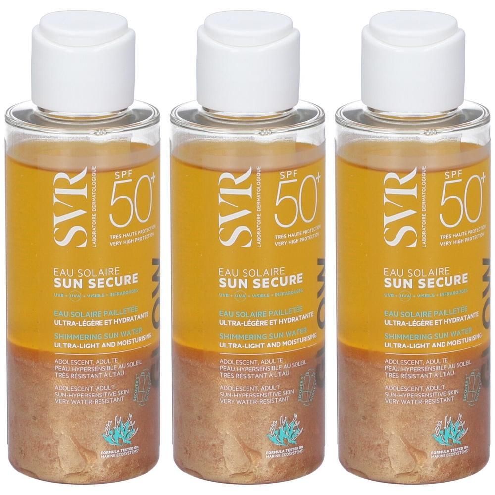 Tre flaconi di SVR Sun Secure Eau Solaire SPF 50. Liquido trasparente con pagliuzze dorate.