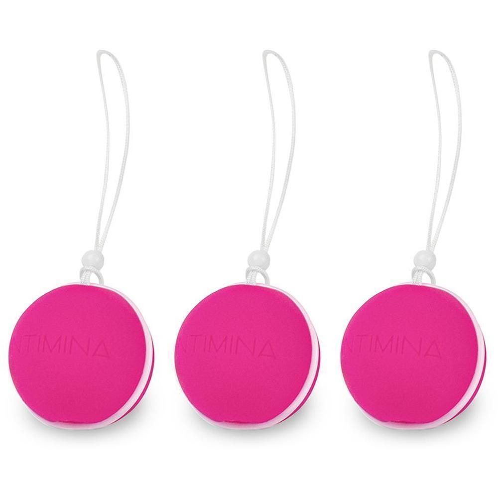 Tre palline Kegel rosa con cordini, ognuna con il marchio INTIMINA.