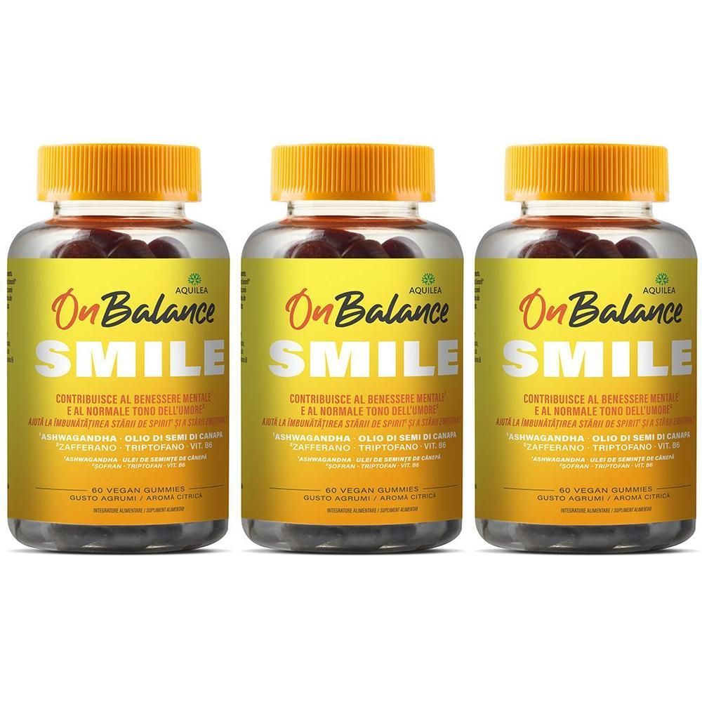 Tre flaconi di caramelle gommose Aquilea Onbalance Smile con tappi ed etichette gialle.