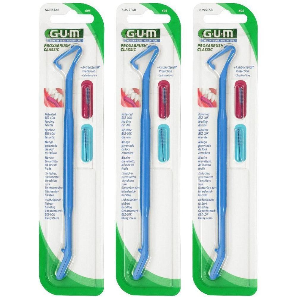 Tre confezioni di GUM Proxabrush Classic. Spazzolini interdentali blu con testine di ricambio rosse e blu.