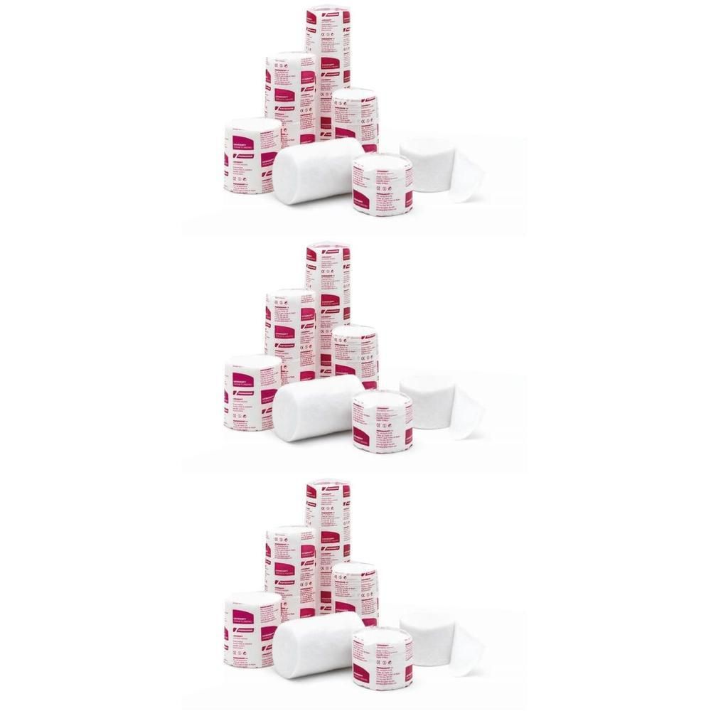 Diversi rotoli di ovatta sintetica bianca di varie dimensioni, con etichette rosa.