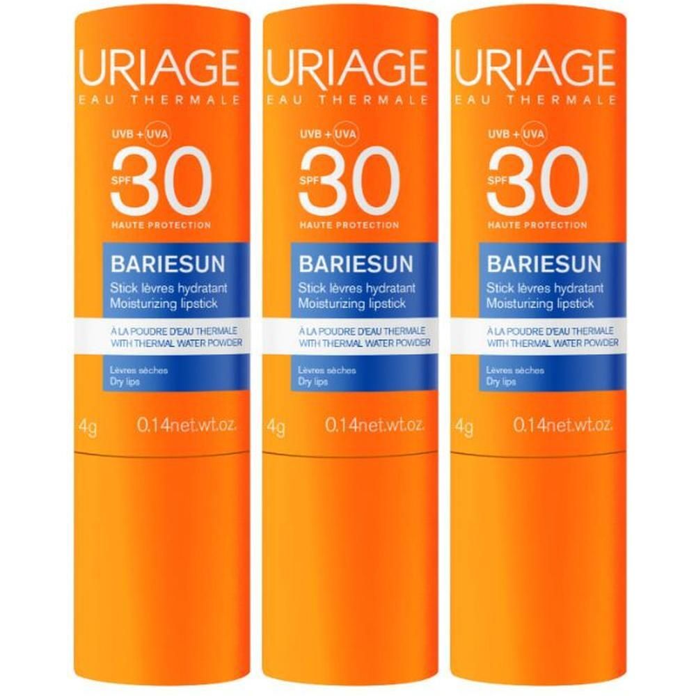 Tre stick solari arancioni SPF 30 per labbra e zone sensibili.