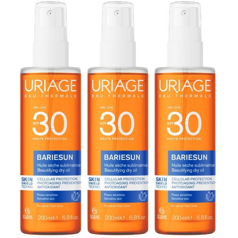 Tre flaconi di olio secco URIAGE Bariésun SPF30 con spray.