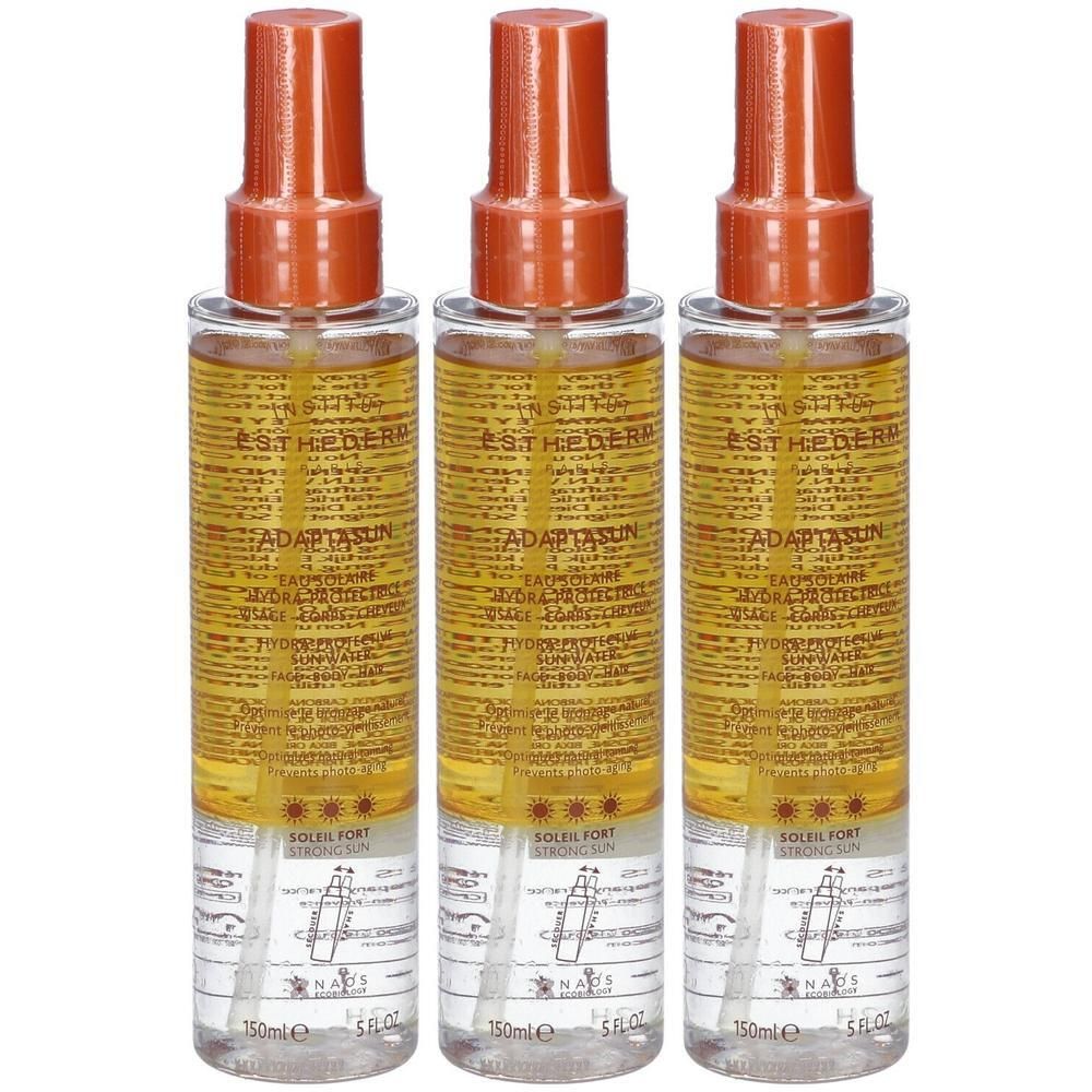 Tre flaconi di spray solare Esthederm Adaptasun, 150ml.