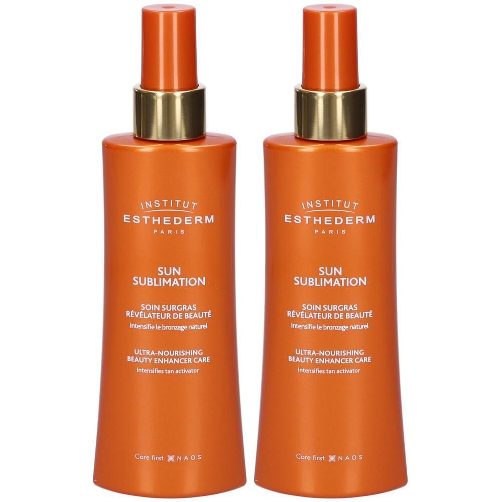 Due flaconi spray arancioni Institut Esthederm Sun Sublimation.