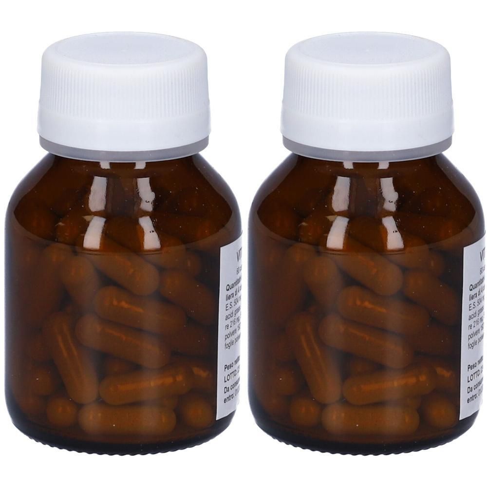 Due flaconi in vetro marrone con tappi bianchi, riempiti di capsule marroni.