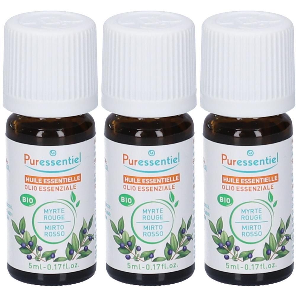 Tre flaconi di olio essenziale di Mirto Bio Puressentiel. Flaconi in vetro marrone con tappi a vite bianchi ed etichette.