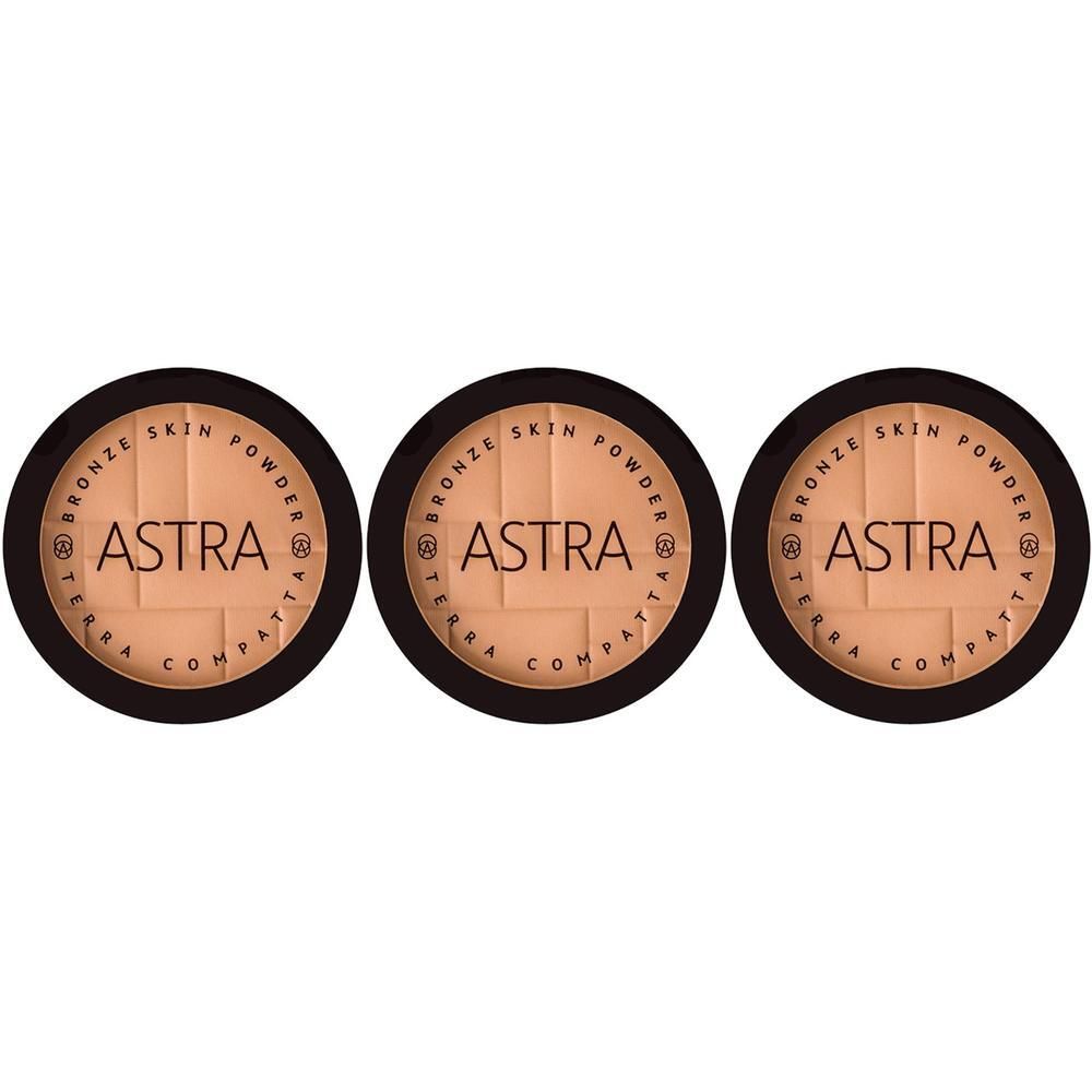 Tre ciprie compatte Astra Bronze Skin Powder in contenitori rotondi.
