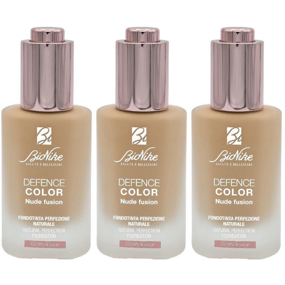 Tre flaconi di fondotinta BioNike Defence Color Nude Fusion beige.