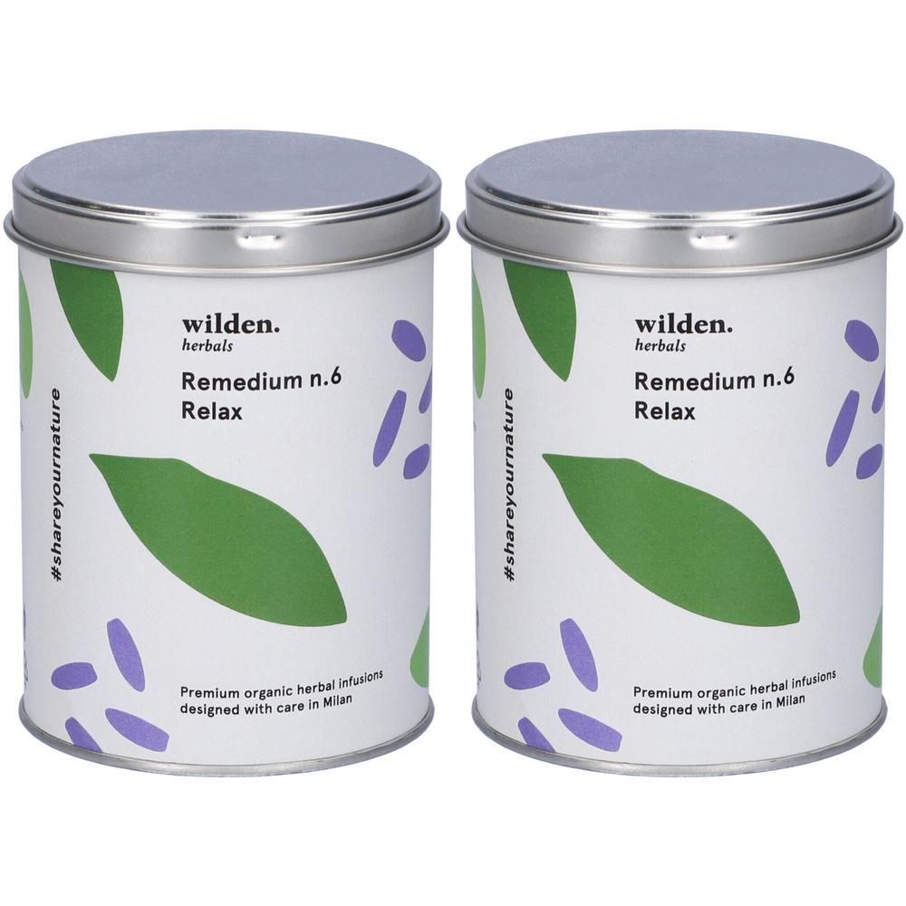 Due lattine Wilden Herbals Remedium n.6 Relax tisana. Bianco con motivi verdi e viola.