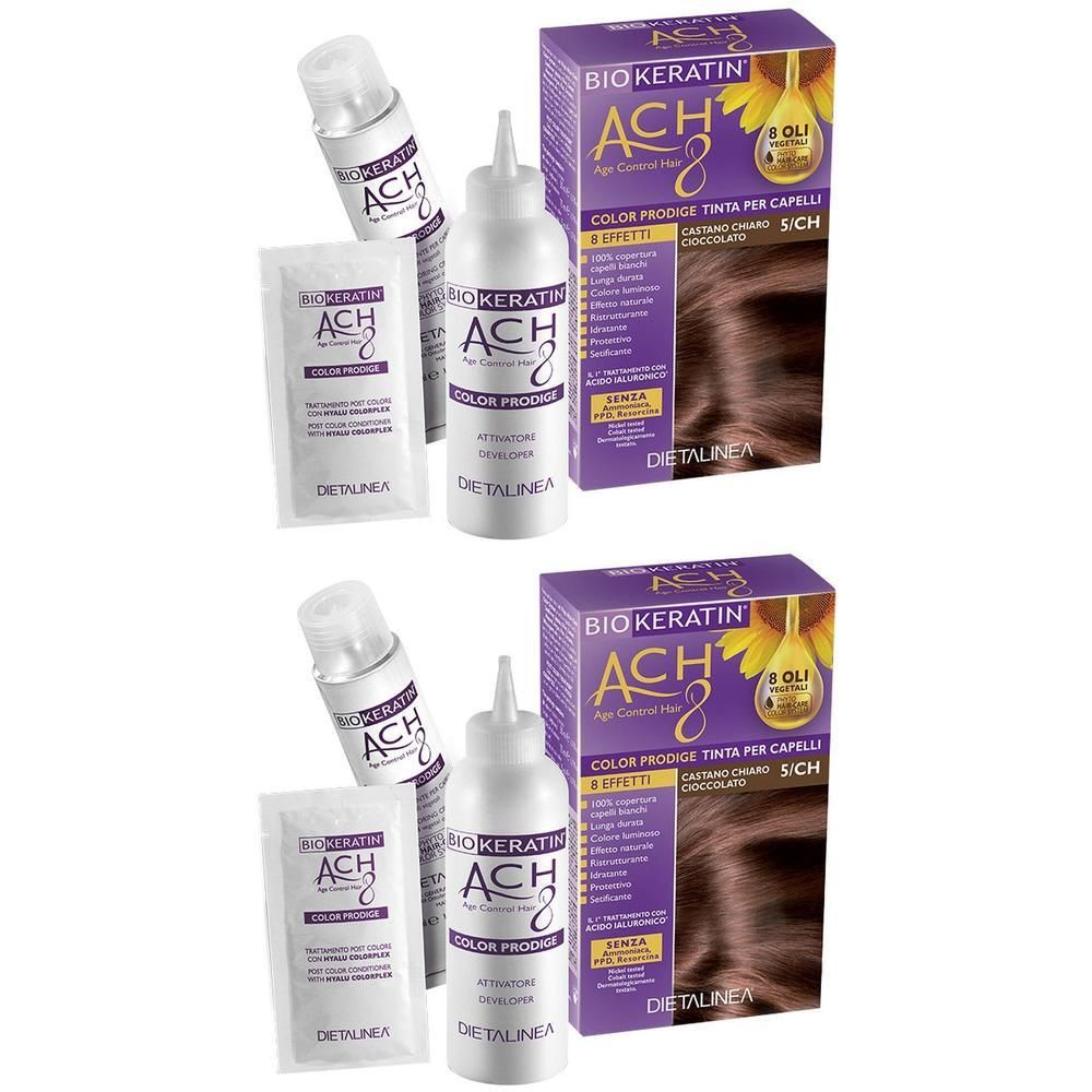 Due confezioni di tintura per capelli con flacone, fiala e bustina. Scatola viola con scritta 'BIO KERATIN ACH 8'.