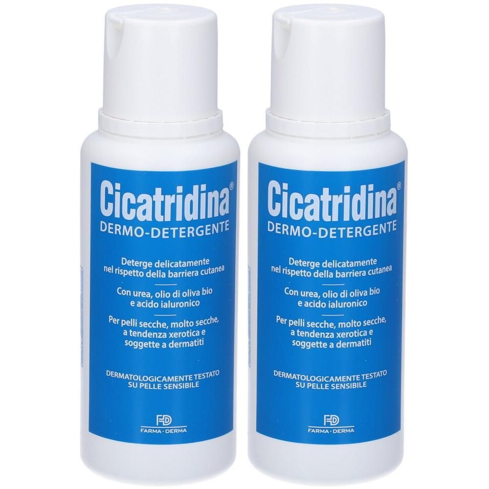 Due flaconi di Cicatridina Dermo-Detergente con etichette blu.