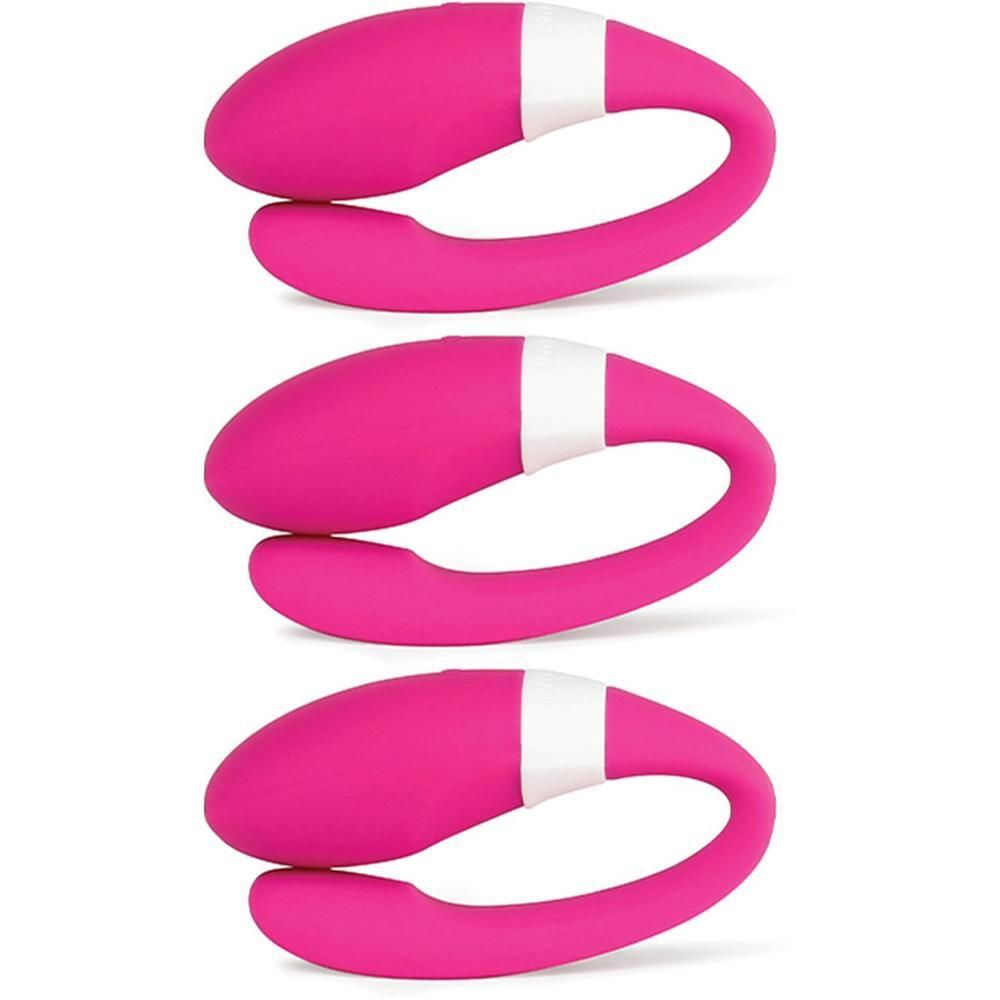 Tre vibratori per coppie identici, rosa con una fascia bianca centrale, allineati uno accanto all'altro.