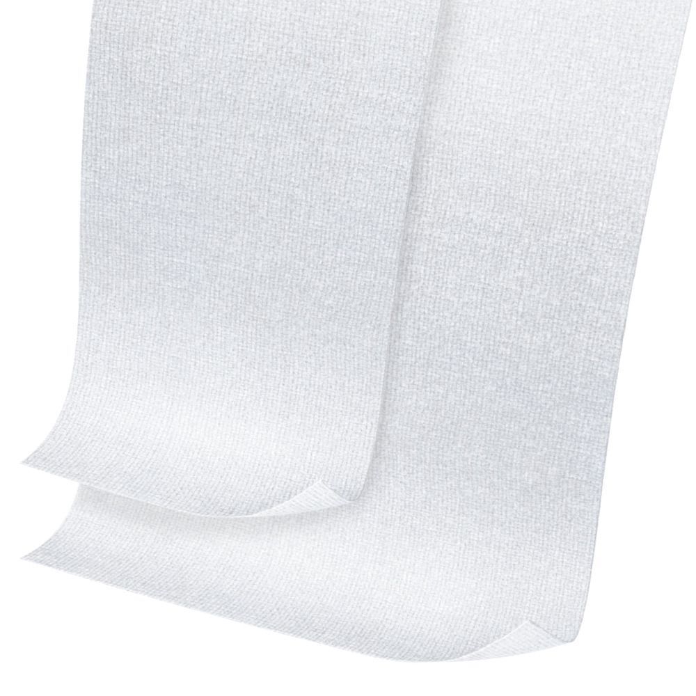 Leukoplast Gazofix, dettaglio di materiale di bendaggio autoadesivo bianco.