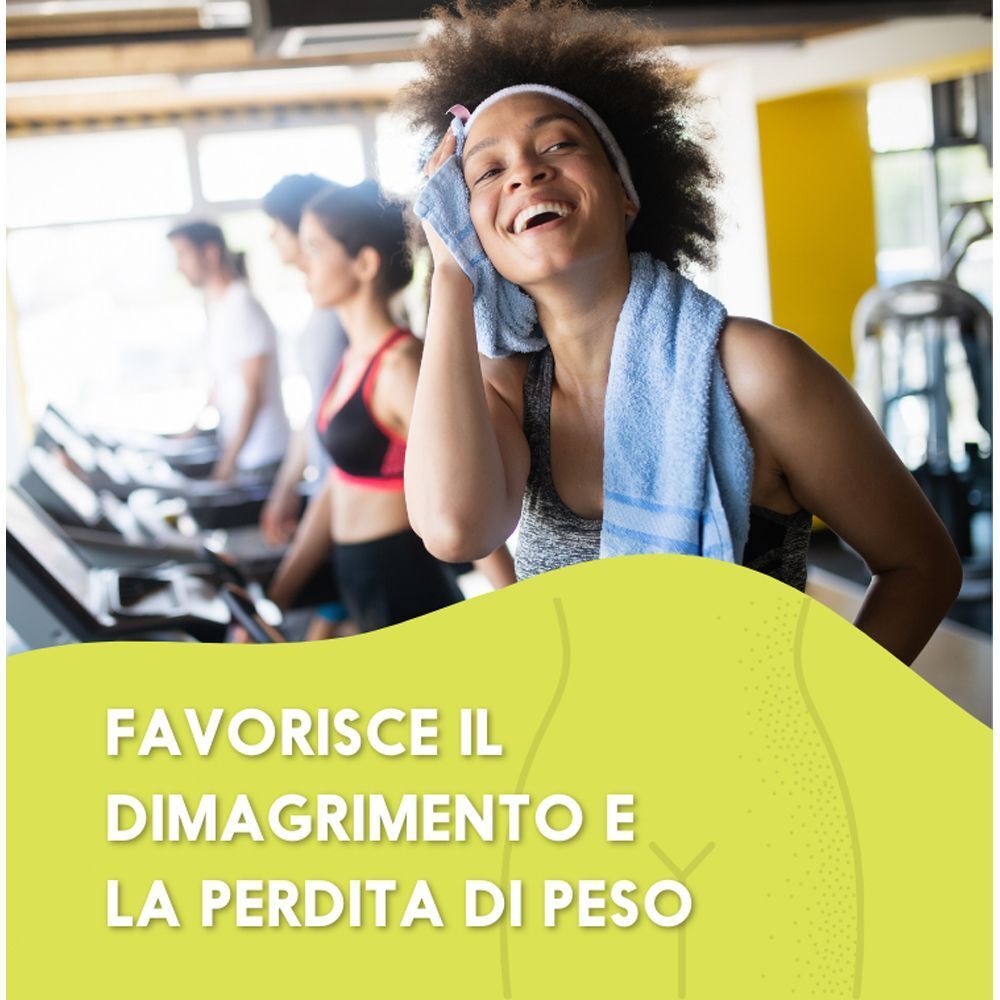 Donna si asciuga il sudore dopo l'allenamento, favorisce la perdita di peso con le capsule F-BRN Women N2 Natural Nutrition.