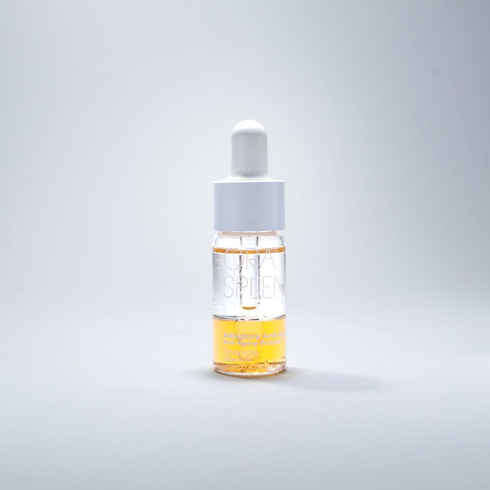 Flacone contagocce ORA SPLENDI Booster Bifase Antiage Tripeptide con liquido bifasico.