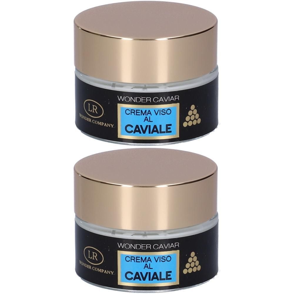 Due vasetti di crema viso Wonder Caviar con tappi dorati ed etichetta nera.