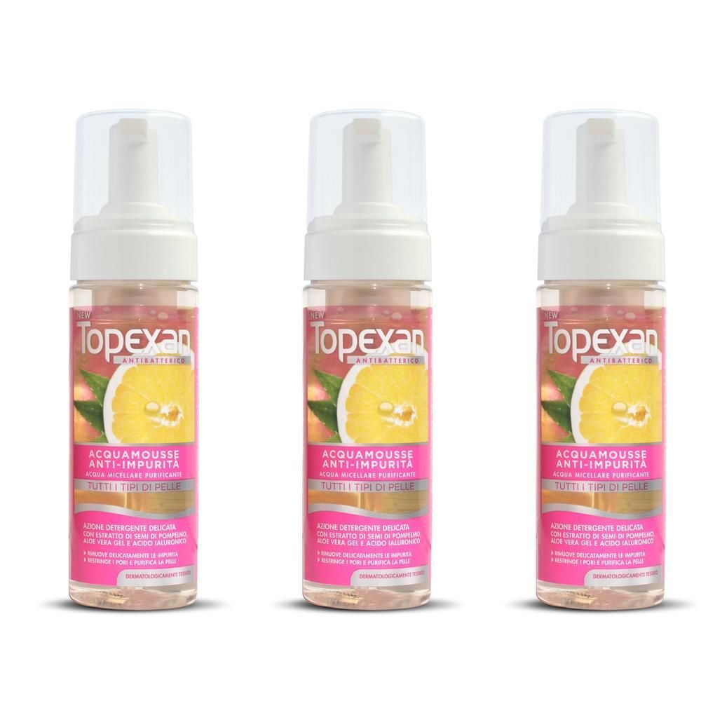 Tre flaconi Topexan Acqua Mousse Anti-Impurita con motivo limone e pesca.