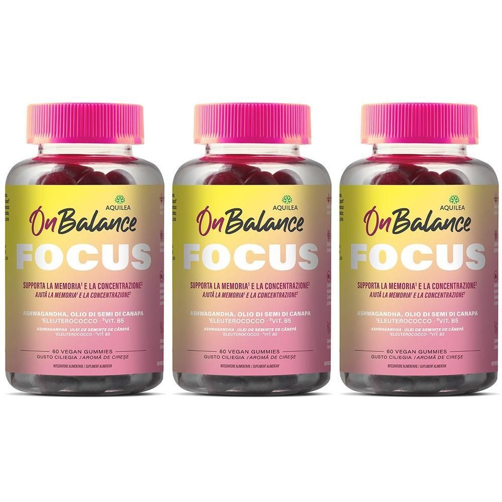 Tre flaconi di caramelle gommose Aquilea Onbalance Focus con tappi rosa.