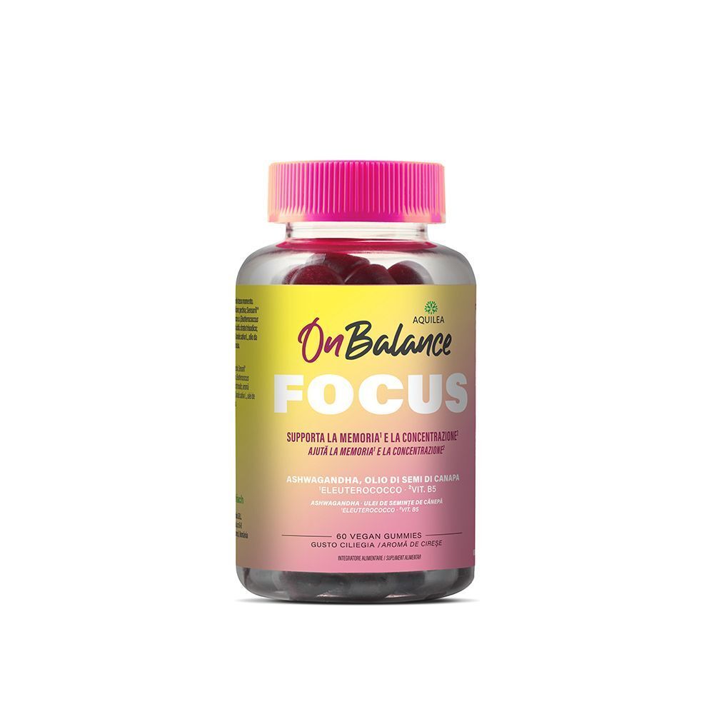 Un flacone di caramelle gommose Aquilea OnBalance Focus con tappo rosa.