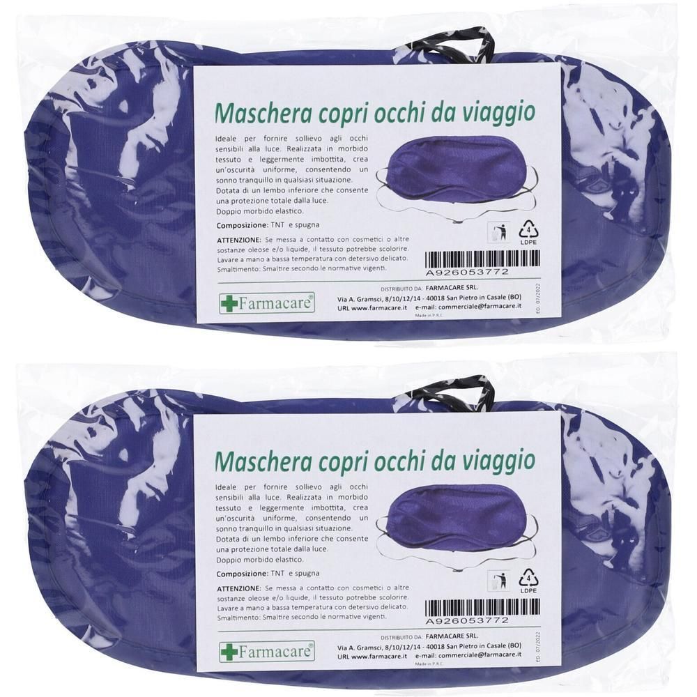 Maschera da viaggio blu scuro con elastico, confezionata in busta trasparente.