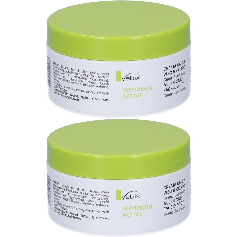 Due vasetti di crema Vebix Phytamin Active con tappi verde chiaro. Per viso e corpo.