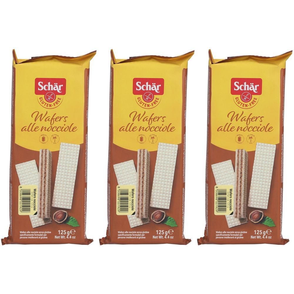 Tre confezioni di Schär Wafers alle nocciole, senza glutine, con ripieno di nocciole.