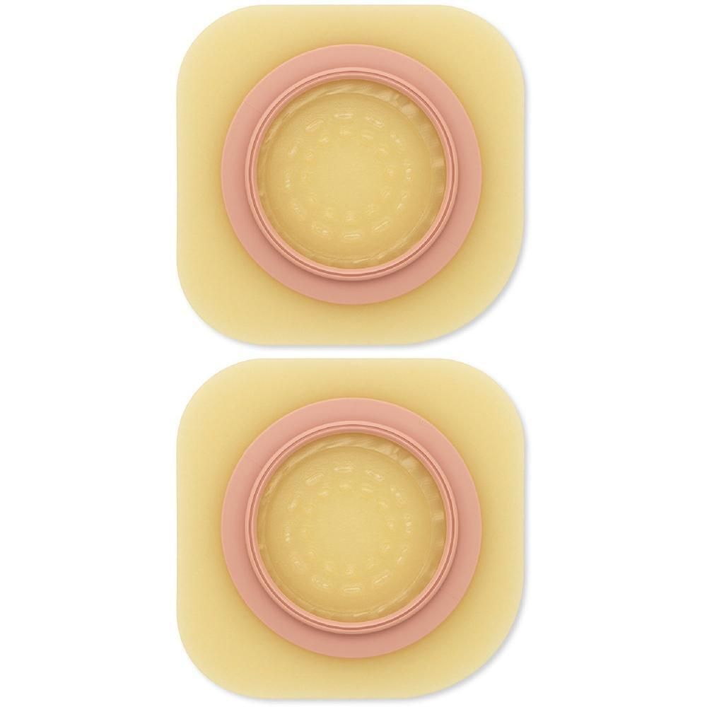 Due placche adesive gialle rettangolari con anello rosa e centro trasparente.