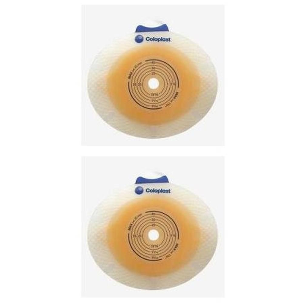 Due placche per stomia Coloplast con guida di centraggio e indicazioni di misura.
