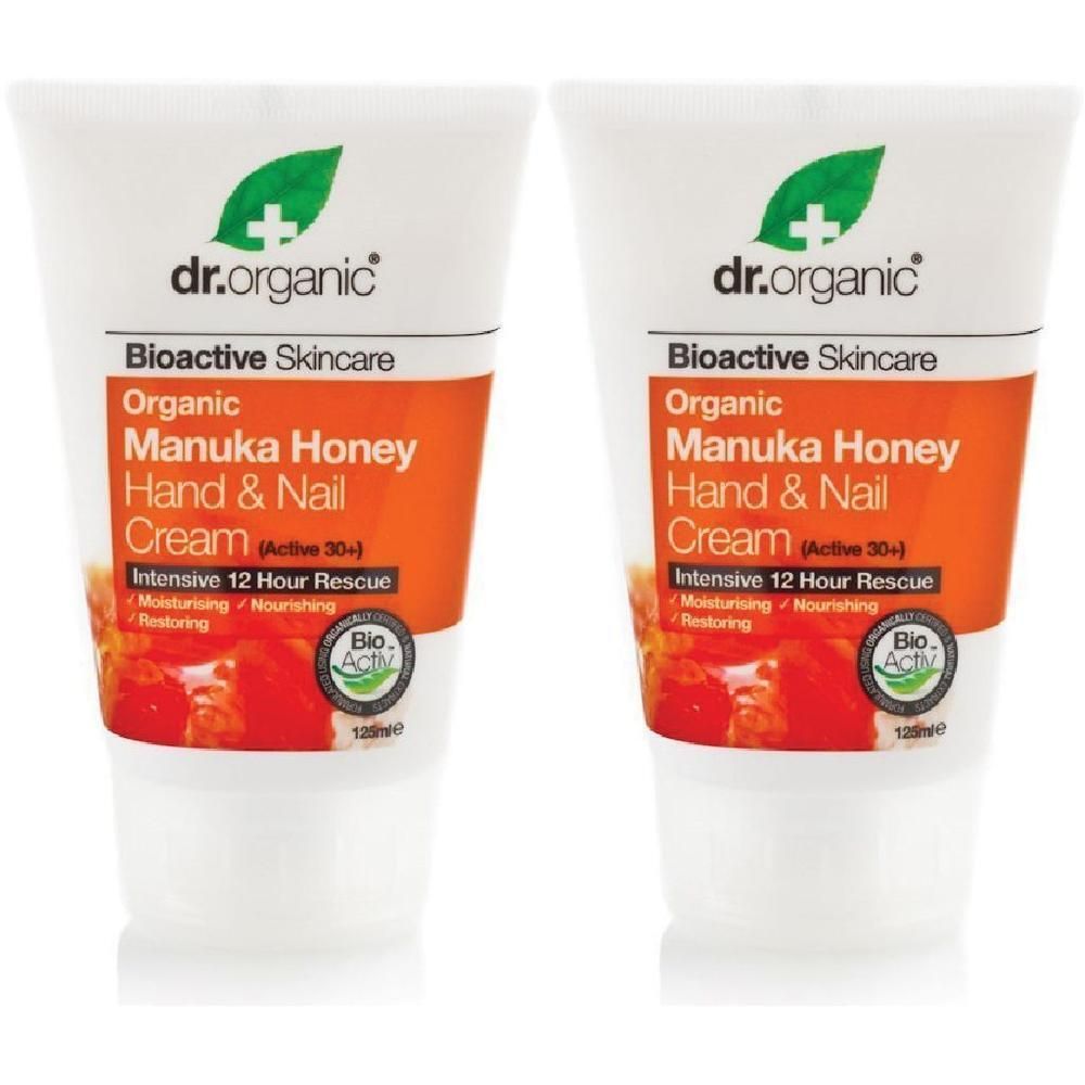 Due tubi di crema mani e unghie al miele di Manuka Dr. Organic.