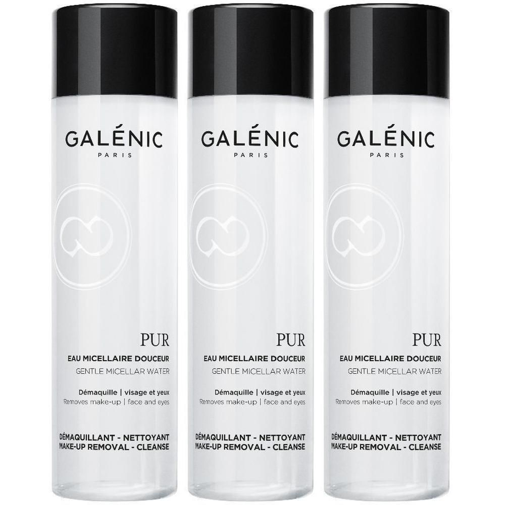 Tre flaconi di GALÉNIC Eau Micellare Delicata con tappo nero, etichette bianche con scritte nere.
