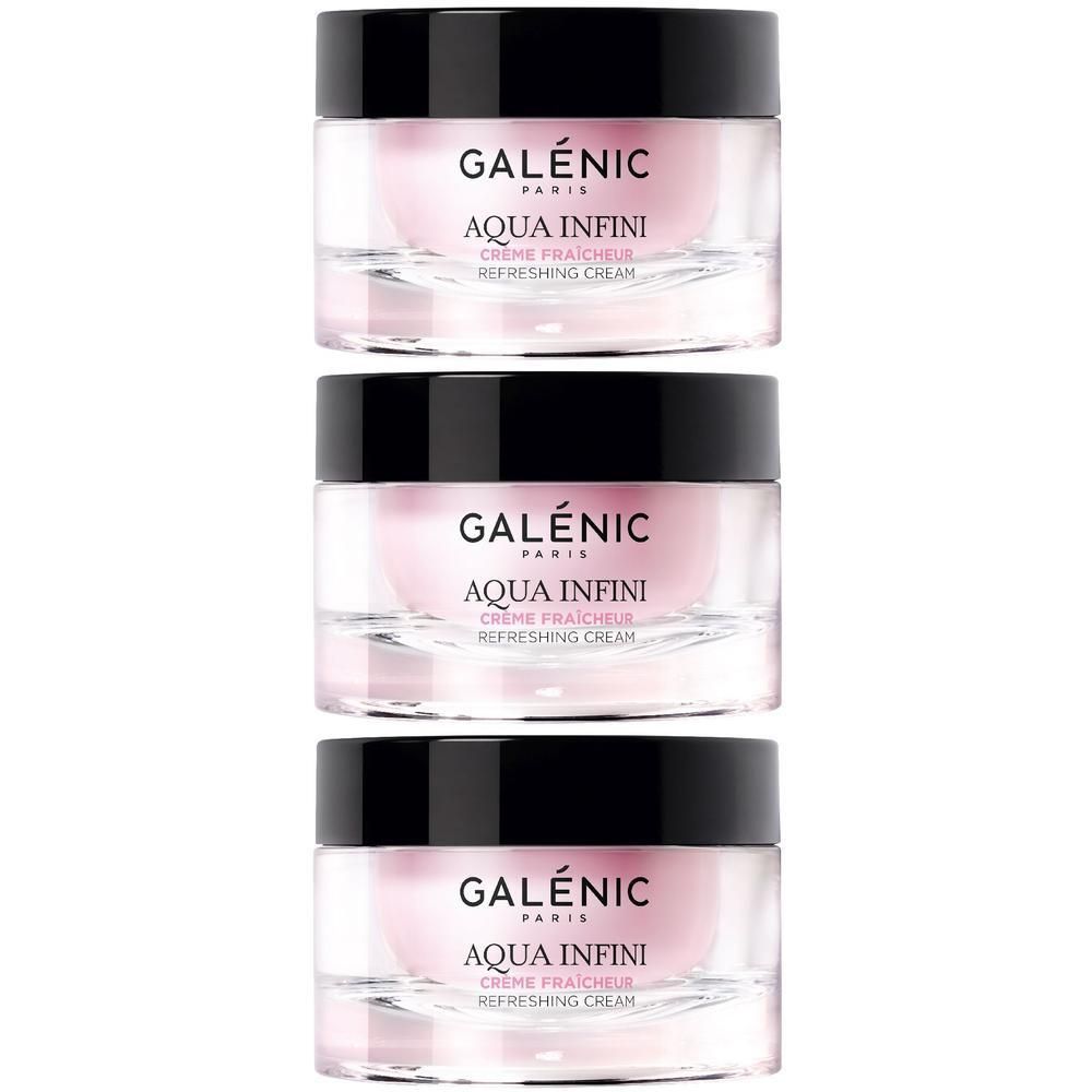 Tre vasetti di crema rinfrescante GALÉNIC AQUA INFINI, contenuto rosa, tappi neri.