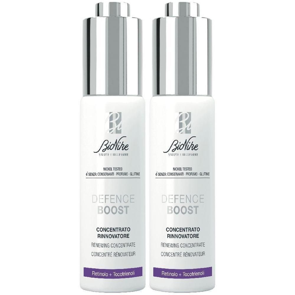 Due flaconi BioNike Defence Boost con pompe argentate. Contiene Retinal + Tocotrienol.