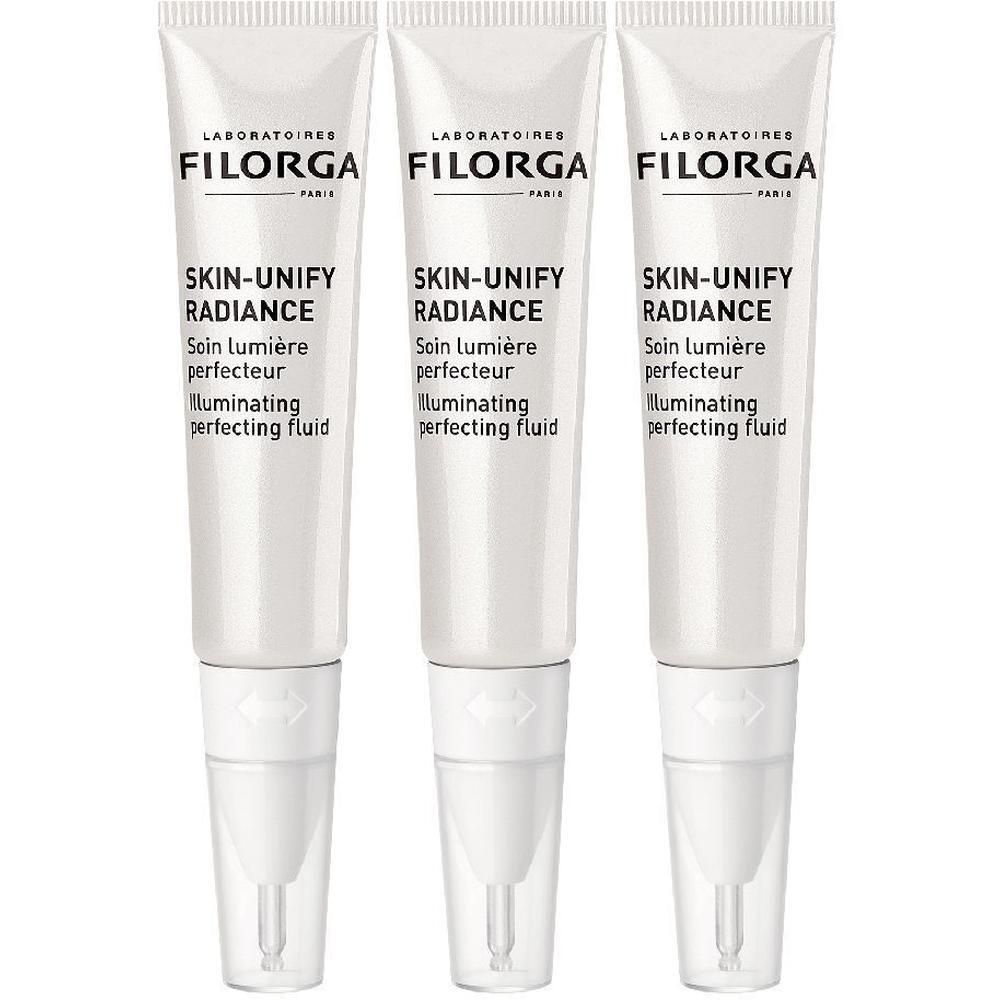 Tre tubi bianchi FILORGA Skin-Unify Radiance con punte applicatrici.