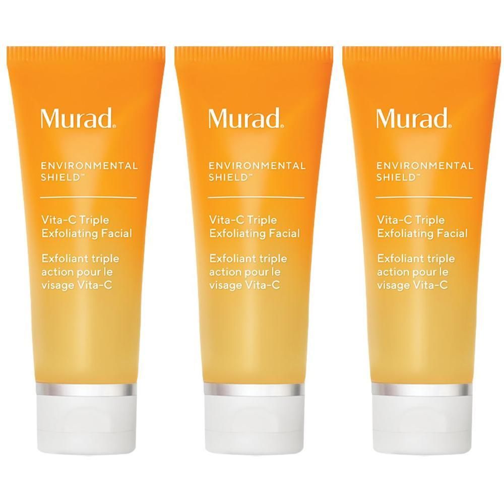 Tre tubetti di Murad Vita-C Triple Exfoliating Facial con tappo argentato e sfumatura arancio-gialla.