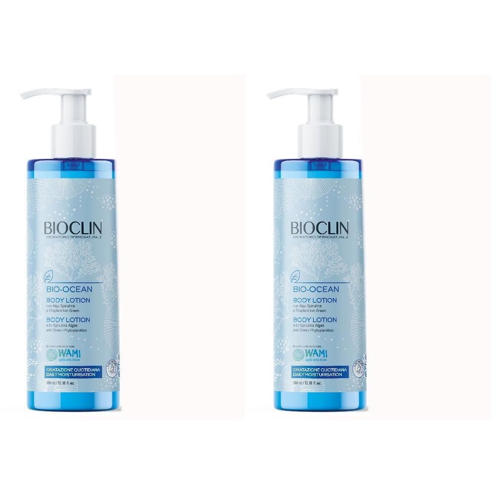 Due flaconi BIOCLIN Bio-Ocean Body Lotion con etichetta blu e dispenser a pompa bianco.