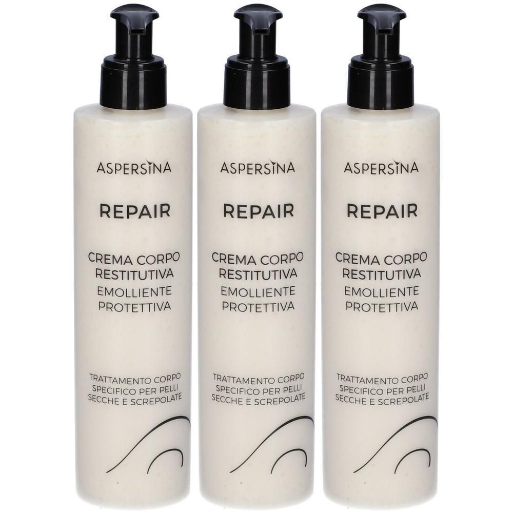 Tre flaconi di crema corpo Aspersina Repair con dispenser a pompa.